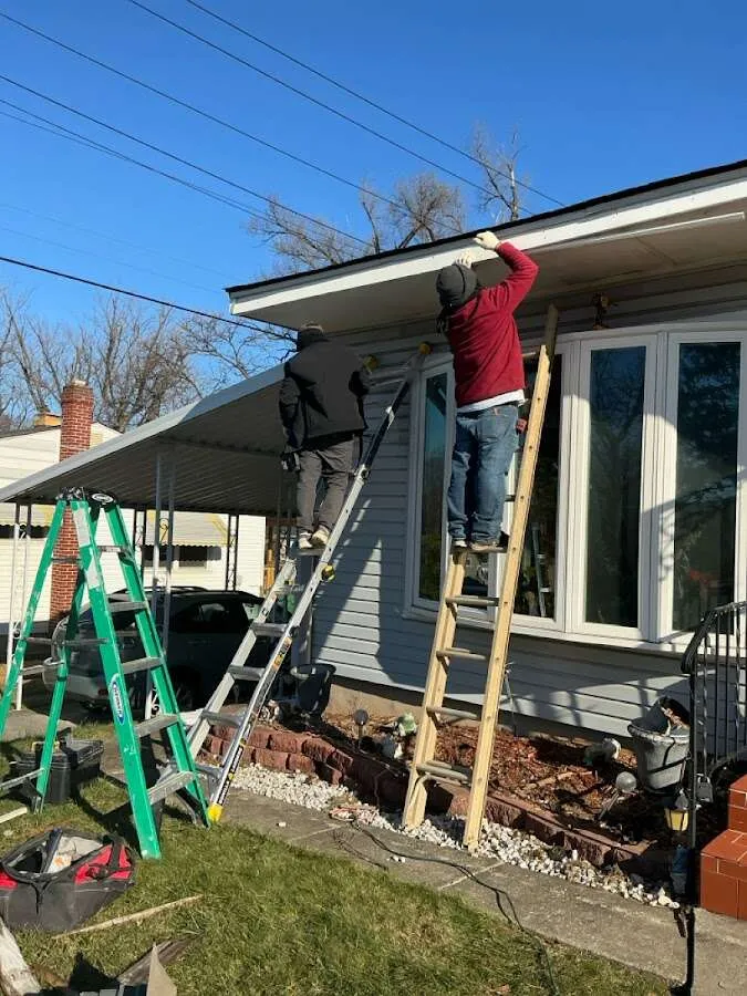 Restoration crew performing exterior repair in Kings Park West