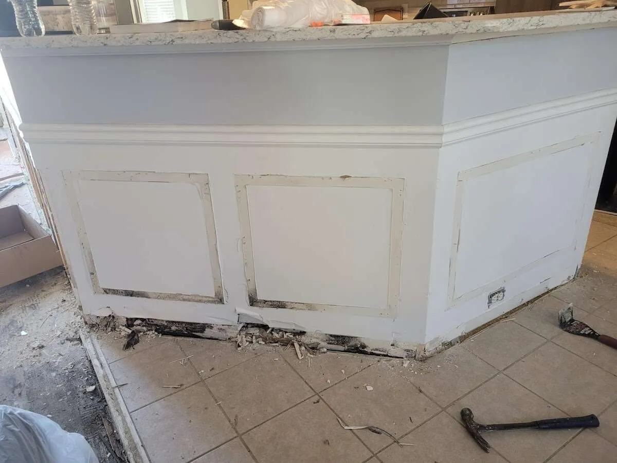 Water damage and mold on kitchen during Storm Damage Restoration in Kings Park West